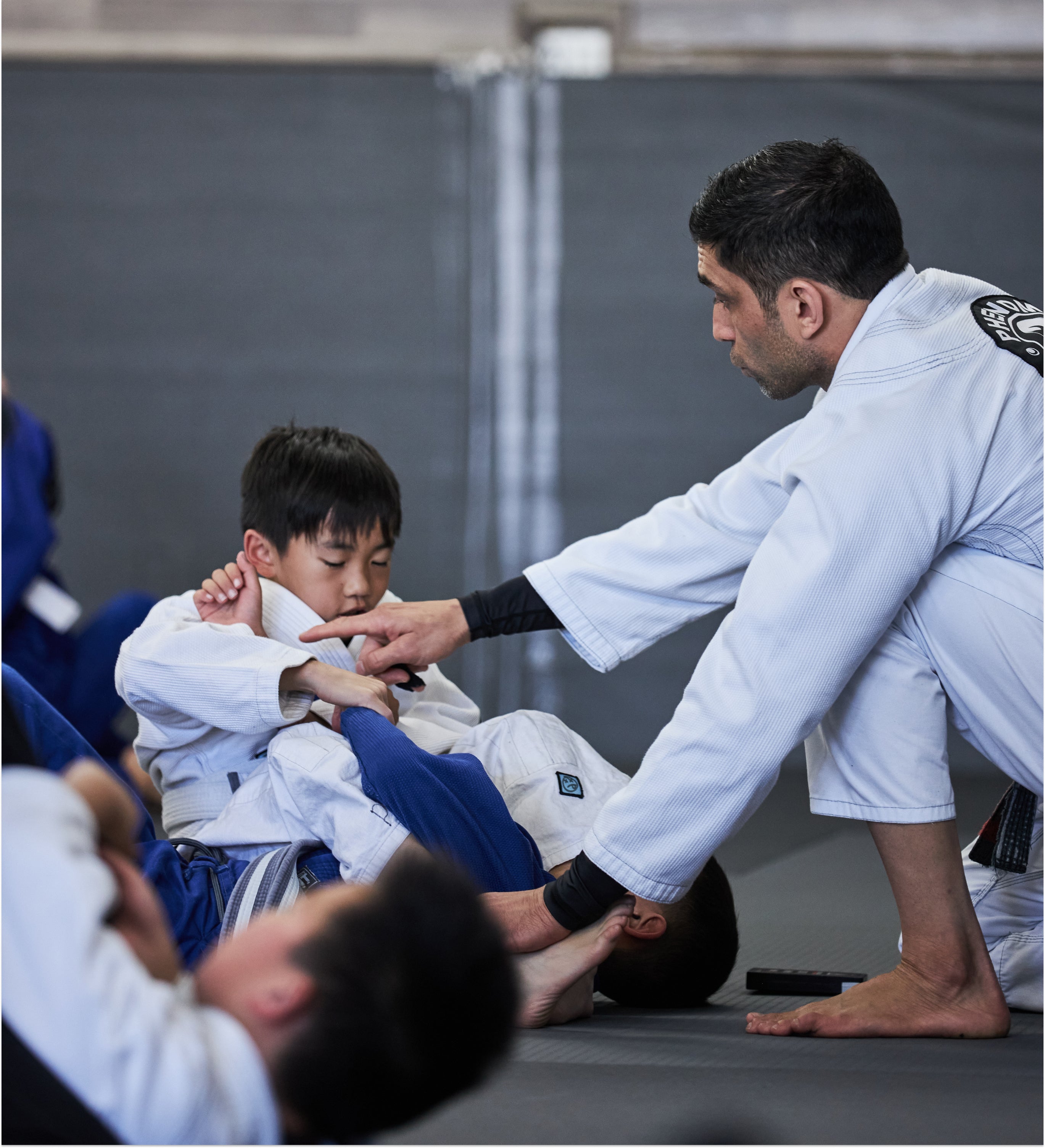 Professor Martin teaching the kids BJJ class